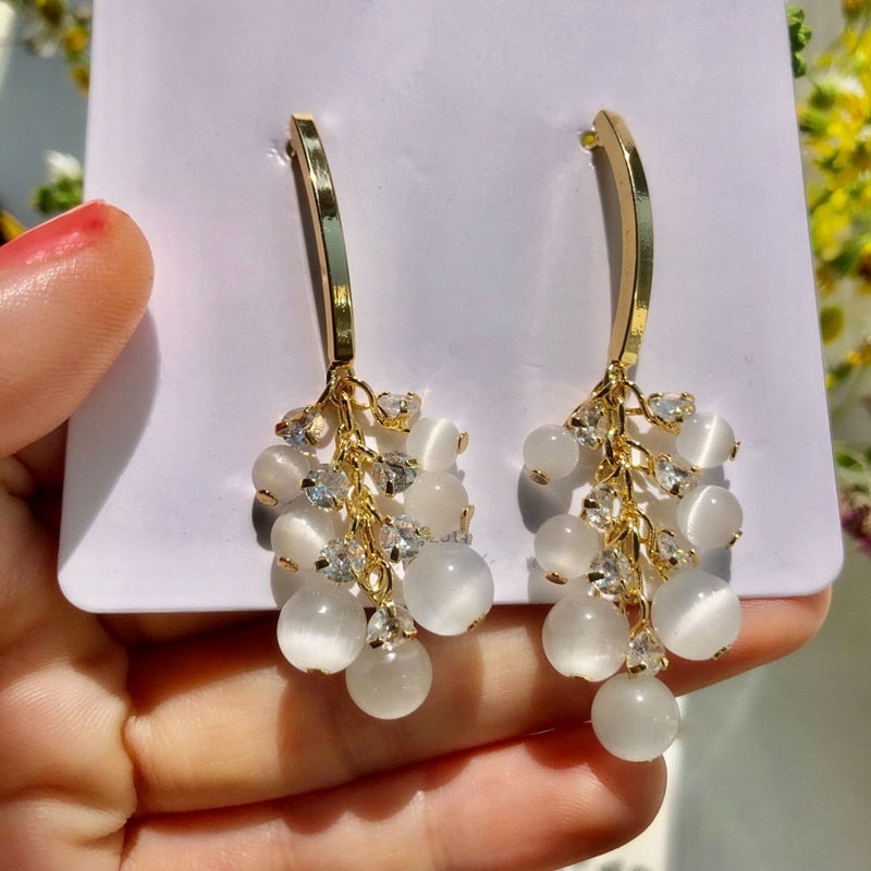 Brincos de cobre com pedra opala