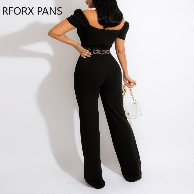 Elegantíssimo macacão com estampa geométrica e mangas bufantes!!! Divino!!!